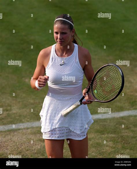 Hannah Klugman in action in the Girls singles on day seven of the 2023 Wimbledon Championships ...