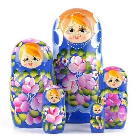 a set of three nesting dolls sitting next to each other