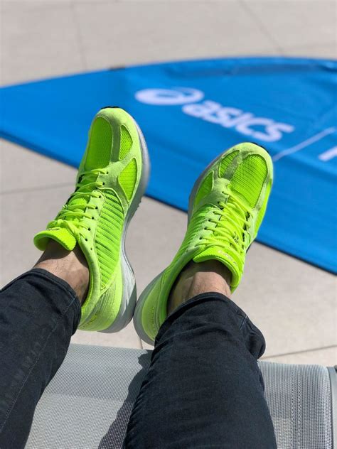 Legs of marathon runners wearing Nike ZoomX Vaporfly Next% running ...