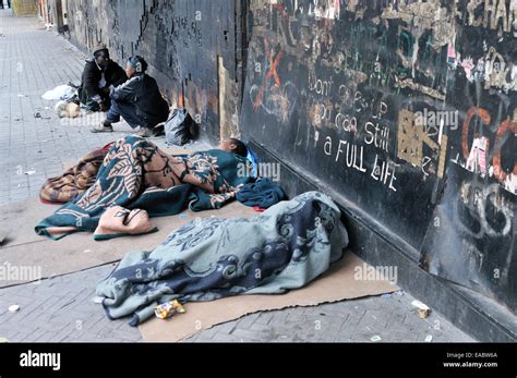 South Africa Johannesburg Hillbrow street kids sleeping on pavement ...