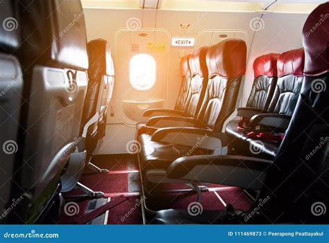 Interior of the Passenger Airplane. Stock Image - Image of light, chair ...