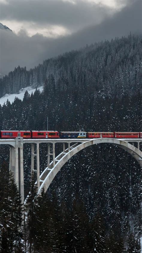 Train Crossing the Langwieser Viaduct - backiee