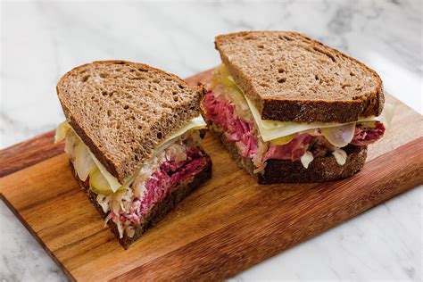 A Reuben Sandwich With Pastrami, Sauerkraut And Cheese usa Photograph ...