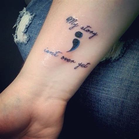 what does a semicolon tattoo mean, my story isn't over yet, written in black, with a semicolon ...