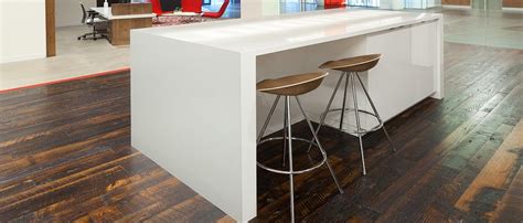 Kitchen island with mitred downstands in Cambria White Cliff quartz in a polished finish ...