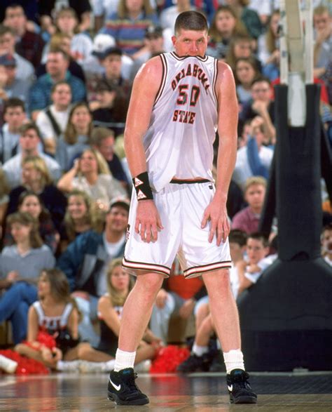 Oklahoma State center Bryant Reeves tastes his... - SI Photo Blog