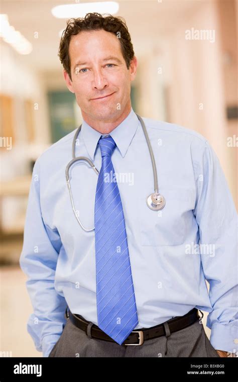 Doctor Standing In A Hospital Corridor Stock Photo - Alamy