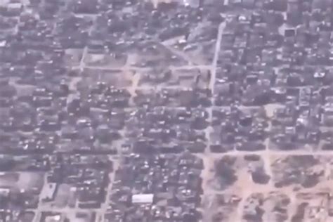 A video from the air depicts extensive destruction of entire ...