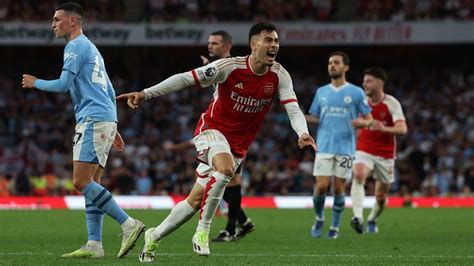 Late deflected Gabriel Martinelli goal gives Arsenal narrow victory over Manchester City | CNN