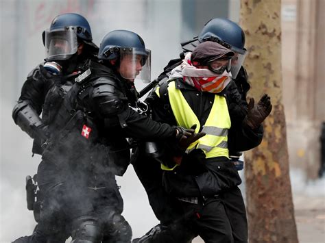 Paris protests: Eiffel Tower reopens as hundreds of activists remain in police custody | The ...