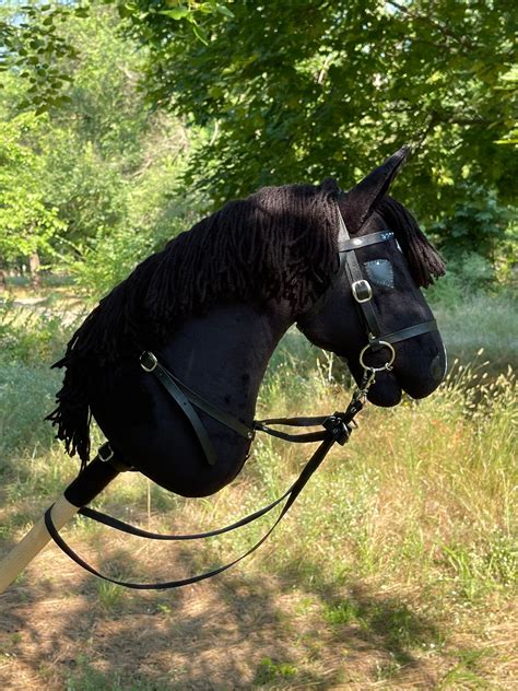 Black hobby horse with beautiful bridle and martingale stick | Etsy