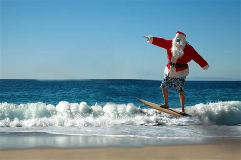 ‘Surfing Santas’ hit Cocoa Beach amid Florida arctic chill