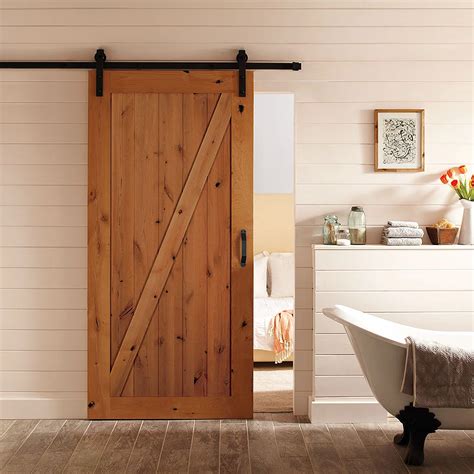 Masonite 42-inch x 84-inch Z-Bar Knotty Alder Solid Core Barn Door with ...