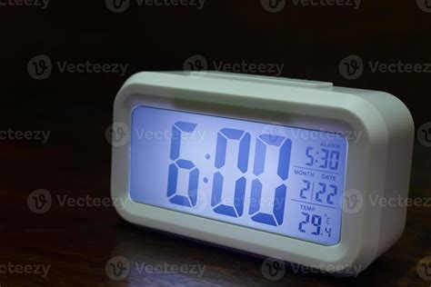 Digital alarm clock 6am close up image. 10348025 Stock Photo at Vecteezy