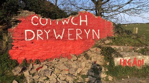 'Cofiwch Dryweryn' drowned village graffiti rebuilt - BBC News