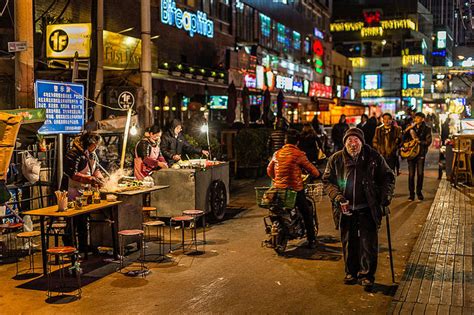 Photo of the Day: Walking on a Busy Street in Beijing | Asia Society