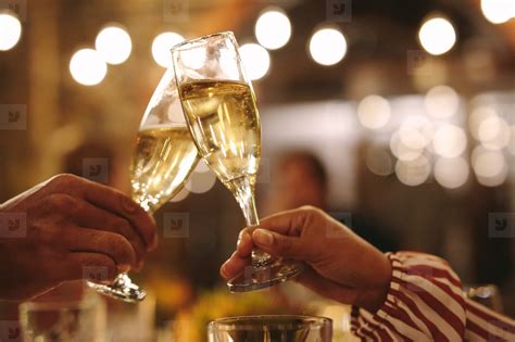 Couple toasting champagne glasses at party stock photo (167131 ...