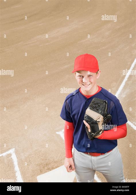 Baseball player in uniform Stock Photo - Alamy