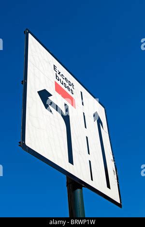 london bus lane restrictions sign post taxi cycle Stock Photo - Alamy