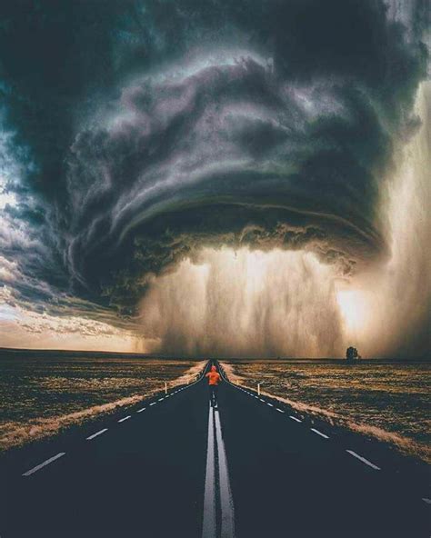 A supercell thunderstorm rolls across the Montana prairie at sunset. - 9GAG