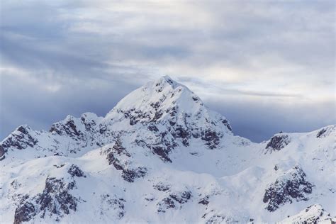 aerial view of snowy mountain peak | Snow mountain, Cold pictures ...