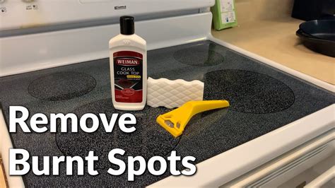 How to Clean glass Stove Top and Remove Burnt Spots with Razor Blade - YouTube