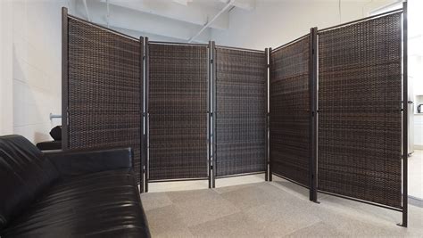 This stylish wicker partition is the perfect outdoor privacy screen for ...