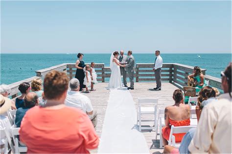 Justin + Emily | Oceanic Pier, Wrightsville Beach NC Wedding | Chris Zachary | Wedding ...