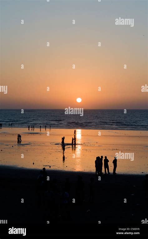 Sunset on Juhu beach, Bombay Stock Photo - Alamy