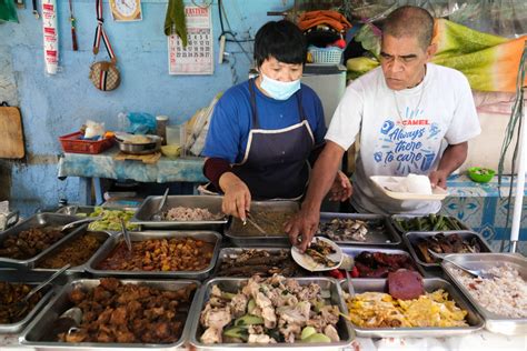 Carinderia vendors and workers lean on each other as food crisis looms | LaptrinhX / News