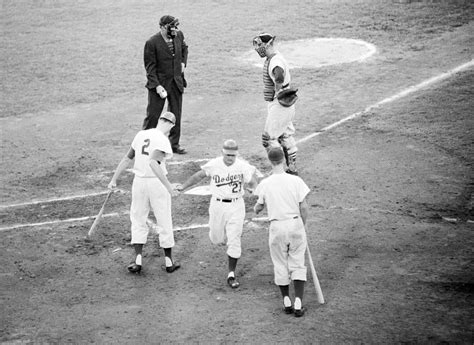 USC Libraries — Dodgers vs. Cardinals, 1958 edition. Los Angeles...