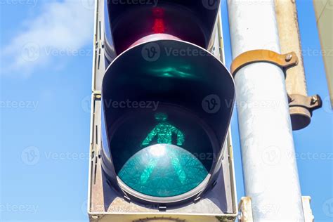 Green and red traffic lights for pedestrians and cars 7561669 Stock Photo at Vecteezy