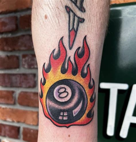 Flaming 8ball done by Julio B (@Juliobtattoo) at Webbs Tattoo in St Pete, FL! : r/traditionaltattoos