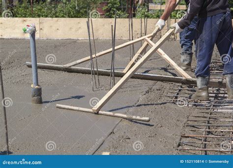 Workers Leveling Fresh Concrete Slab with a Special Working Tool Stock Photo - Image of casting ...