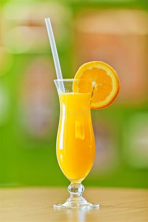 Freshly Squeezed Orange Juice in Hurricane Glass Stock Photo - Image of beverage, ingredient ...