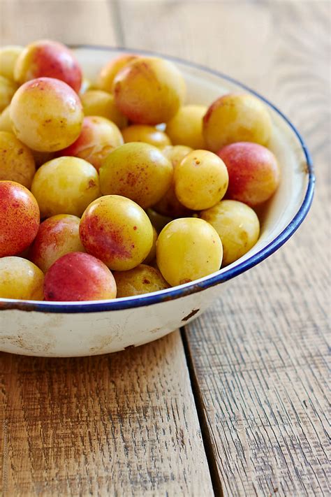 "Mirabelle Plums In A Bowl" by Stocksy Contributor "Harald Walker ...