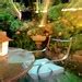 Lights, patio table, flowers, lamp, chair, night, A Garden for the Buddha, Seattle, Washington, USA