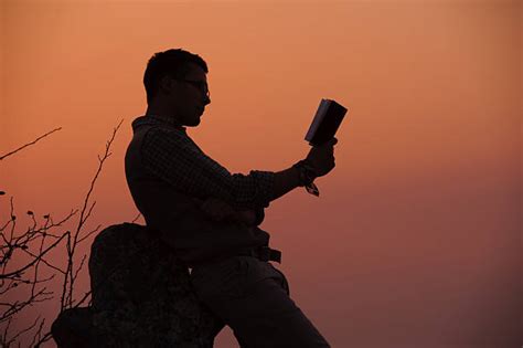 Man Reading Bible Silhouette Stock Photos, Pictures & Royalty-Free Images - iStock