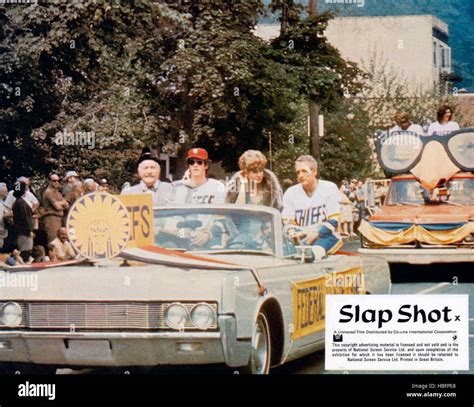 SLAP SHOT, riding in front car from left: Strother Martin, Michael Ontkean, Lindsay Crouse, Paul ...