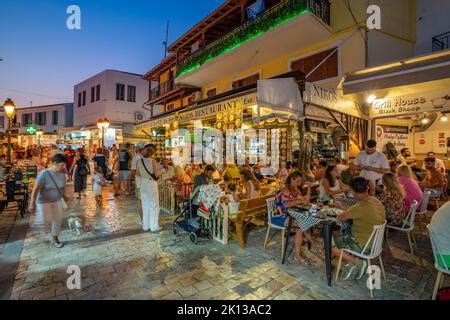 Busy street and nightlife in Skiathos Town, Skiathos Island, Sporades ...