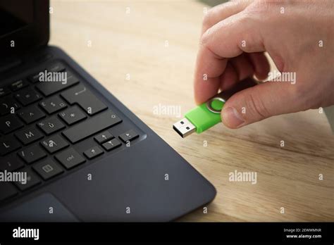 closeup stick usb into laptop Stock Photo - Alamy