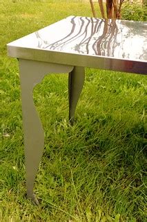 In the spring grass, steel dining room table with curvy le… | Flickr