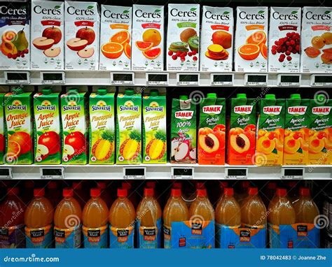 Variety Of Fruit Juice On The Shelves In A Supermarket. Editorial Image ...