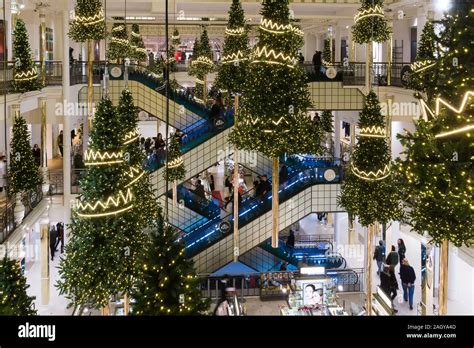 Paris Christmas Le Bon Marche - Decorated interior of Le Bon Marche ...