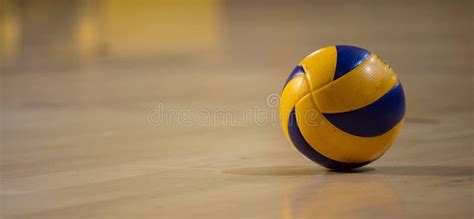 Volleyball Ball on Blurred Wooden Parquet Background. Banner, Space for ...