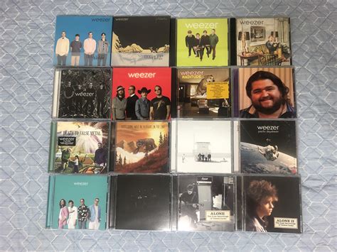 My weezer CD albums collection. Most of them are deluxe edition or ...