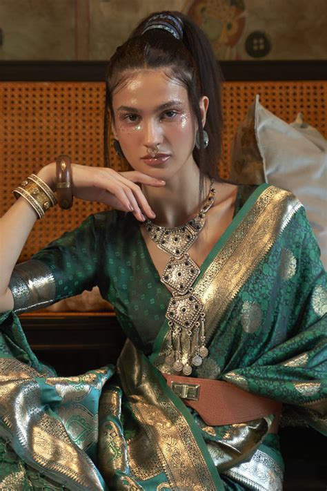 Ingenious Weaving Designs Dark Green Color Satin Silk Saree