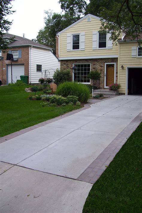 Gray Brushed Concrete Driveway with Decorative Borders with Holland Series Pavers. | Driveway ...