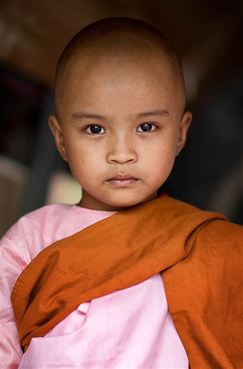 Novice nun wearing pink and orange robes in Yangon, Myanmar. Kids Around The World, People Of ...