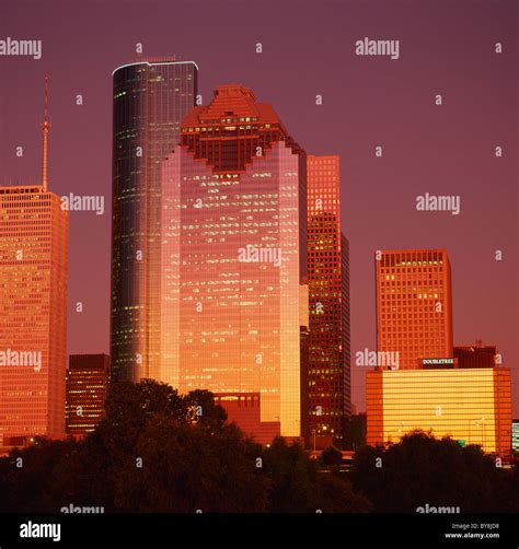 Houston skyline at sunset Stock Photo - Alamy